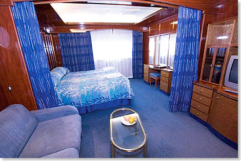 Die Porthole Suite mit Fenster ist 22 qm gro und hat eine Sitzgruppe. Das Bad verfgt ber eine Dusche. Der Reisepreis in dieser Suite betrgt 9.995 US-$