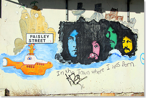 John, Paul, George und Ringo sind in Liverpool allgegenwrtig, hier in Form eines Graffitos in den Docklands der Stadt. In the town where I was born lautet der Anfang des Beatles-Klassikers Yellow Submarine.